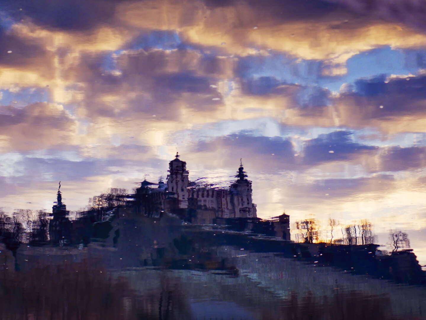 Reflection of Marienberg fortress in the Main river, in Würzburg, Germany